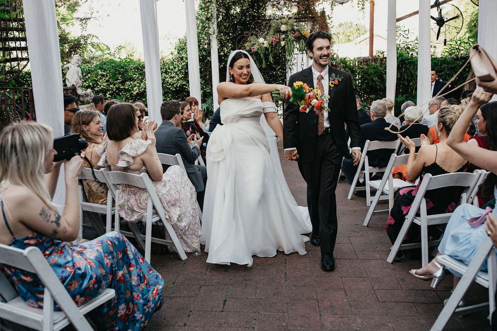 Newlyweds celebrate at their avant garden wedding