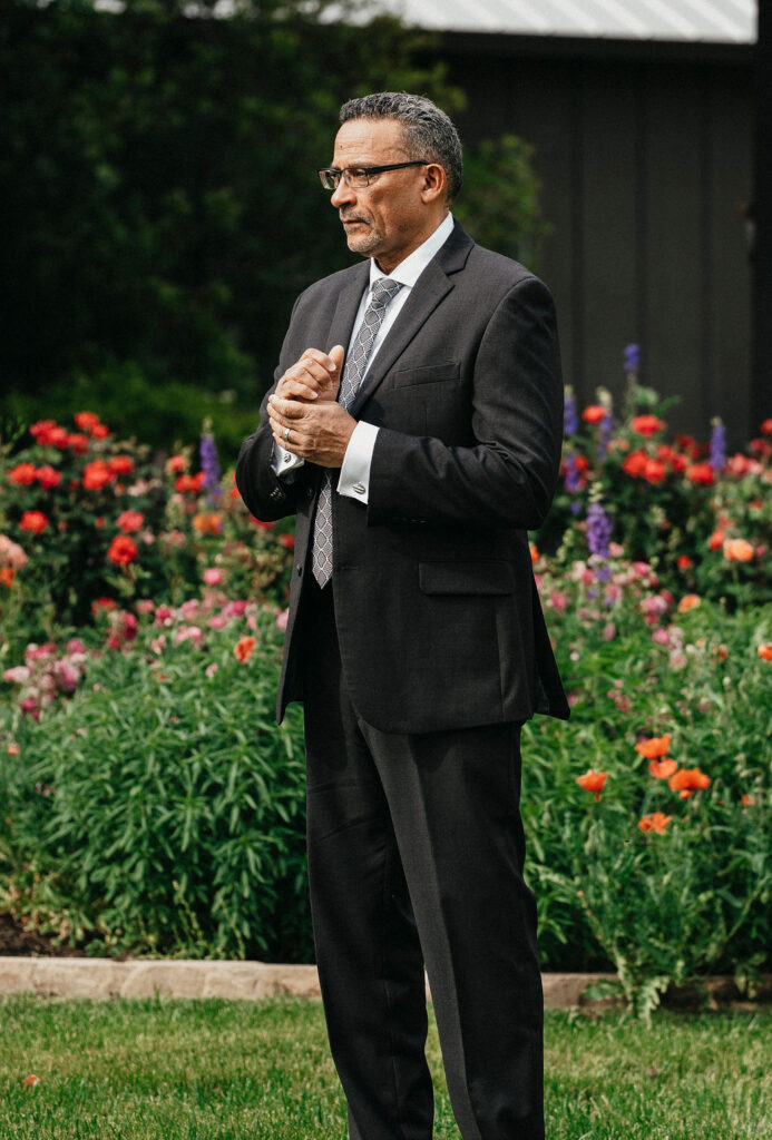 A father awaits a first look at his daughter, an Austin Tx bride