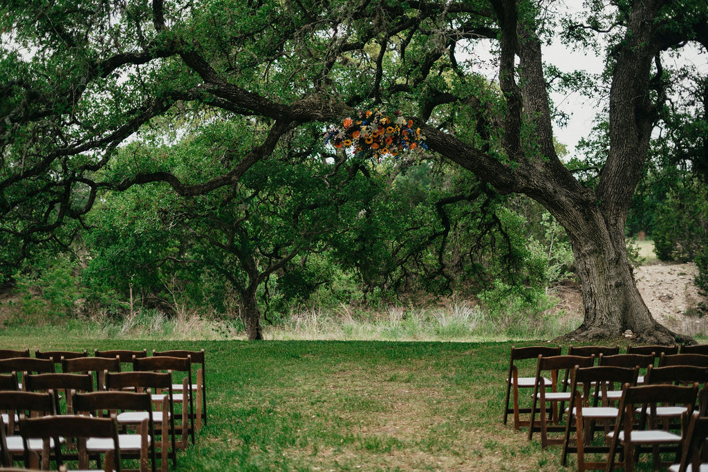 The ceremony site at Pecan Springs Ranch is photographed in Austin, TX