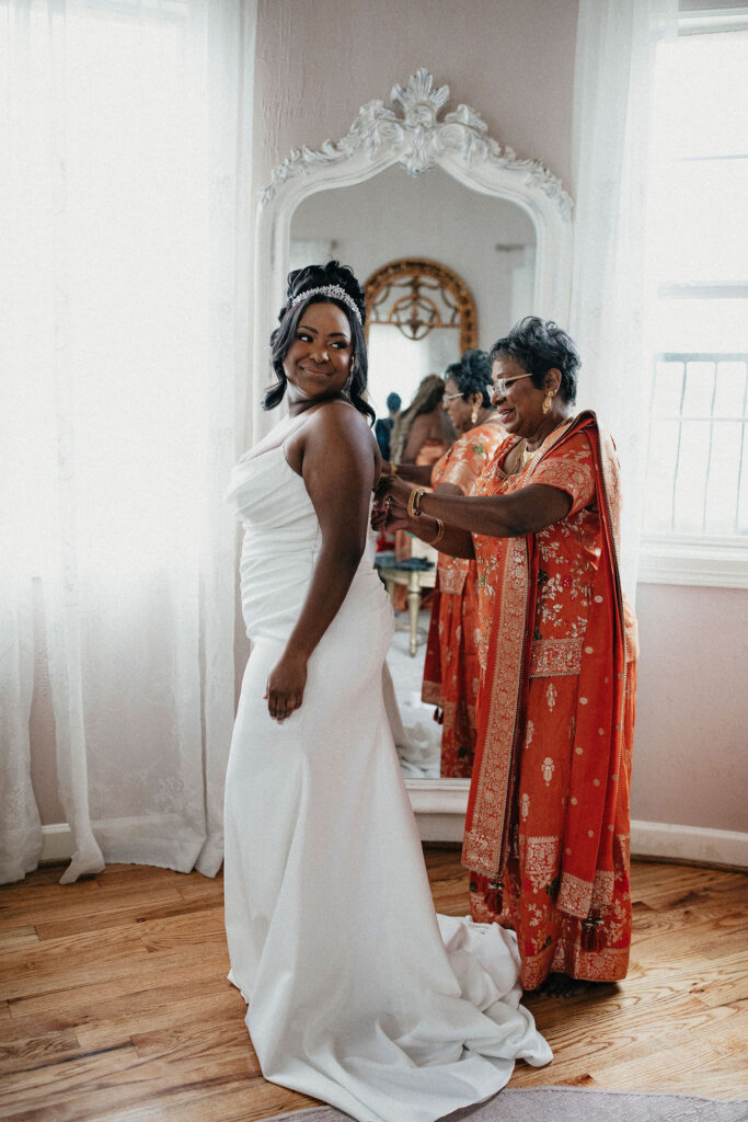 A bride gets ready for her wedding at the springs cypress wedding venue