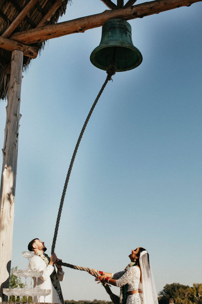 Newlyweds ring the bell at Three Bells Mission
