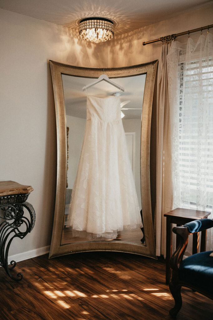 A wedding dress is photographed at a kindred oaks georgetown texas wedding