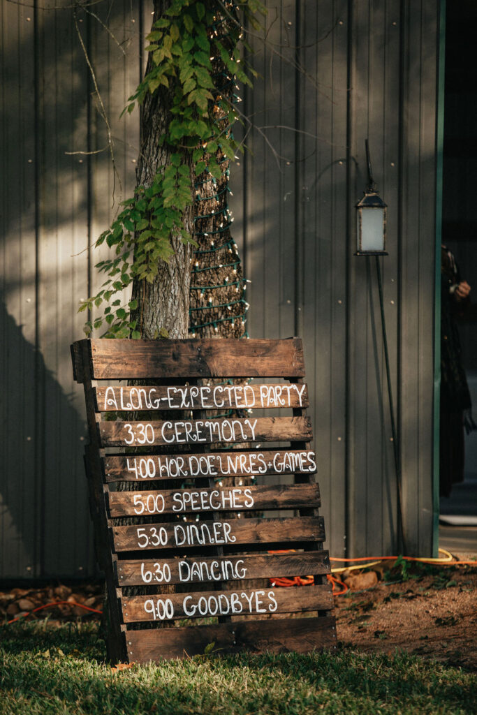 A rustic schedule of events is photographed at a wedding in Houston 