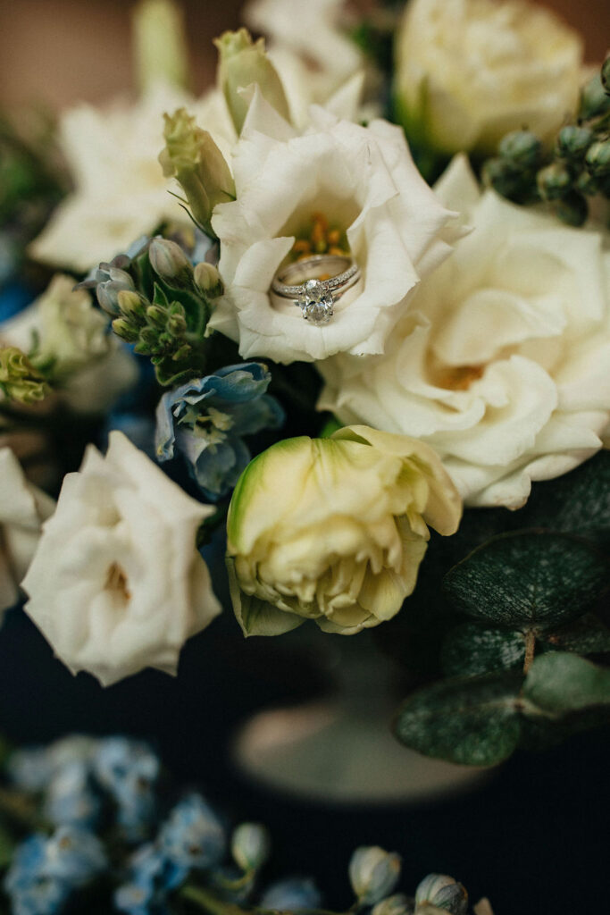 A bridal bouquet is photographed at the peach orchard texas