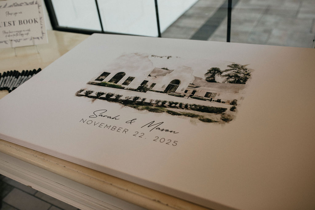 A wedding guest book featuring the peach orchard venue on the cover