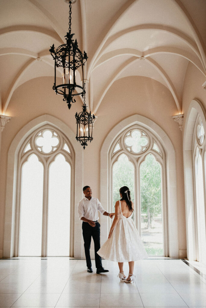 A houston engagement photographer captures a young couple in the French inspired venue, Chateau Nouvelle 