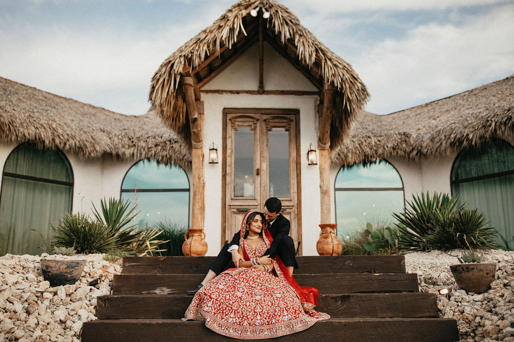 A Texas  couple poses for Houston engagement photos at Three Bells Mission 