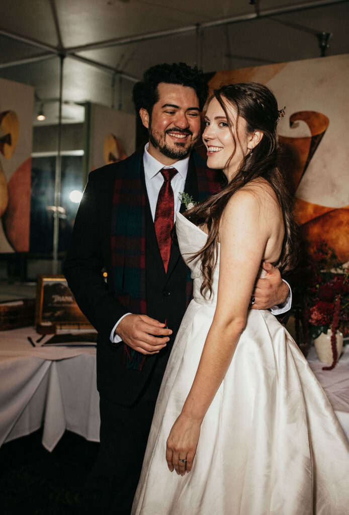 A candid image of newlyweds taken at their Houston elopement reception at Brenner's Bayou. 