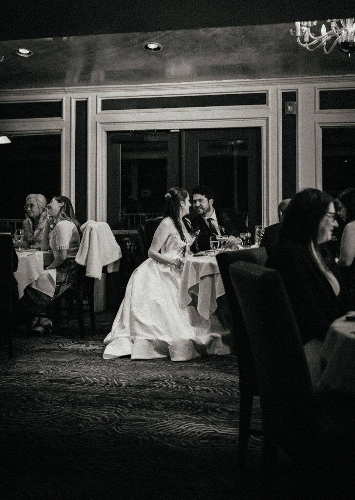 A black and white image of newlyweds taken at Brenner's on the Bayou at their elopement reception. 